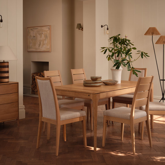 Romana medium extending dining table and 6x Romana padded back chairs