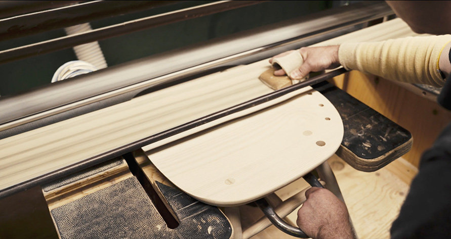 Sanding the seat of the 1877 Windsor chair