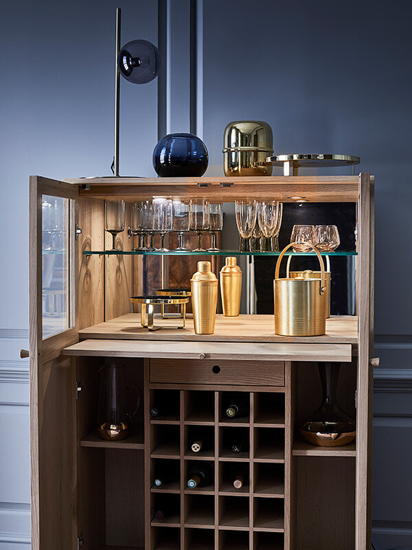 The Ballatta drinks cabinet standing open showing all the storage space inside