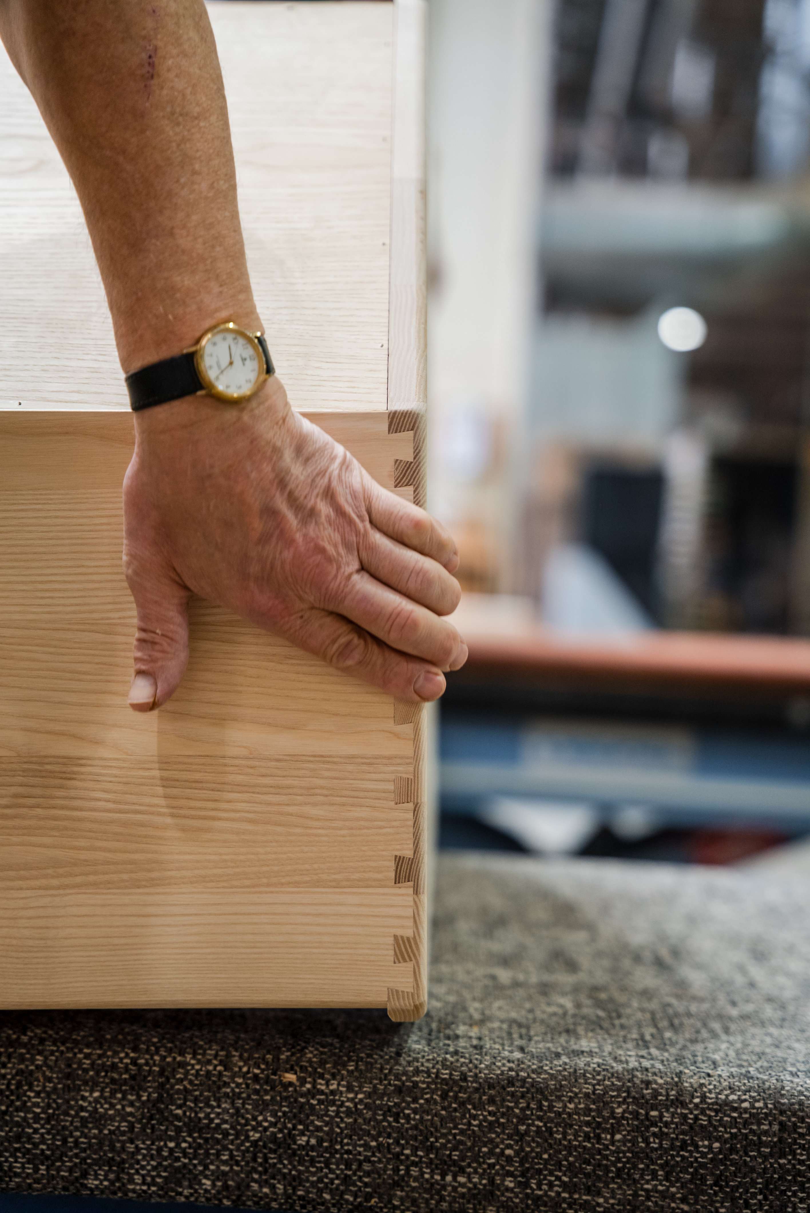 Dovetail joints being sanded