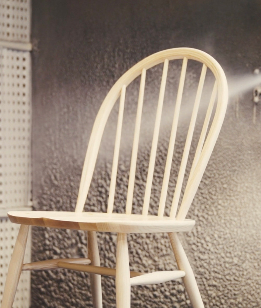 ercol 1877 Windsor chair being finished in the spray booth