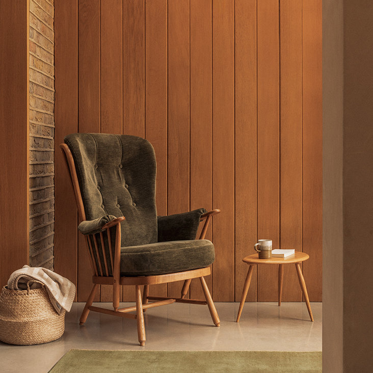 Evergreen chair in U015 fabric and LT finish with the pebble nest of tables