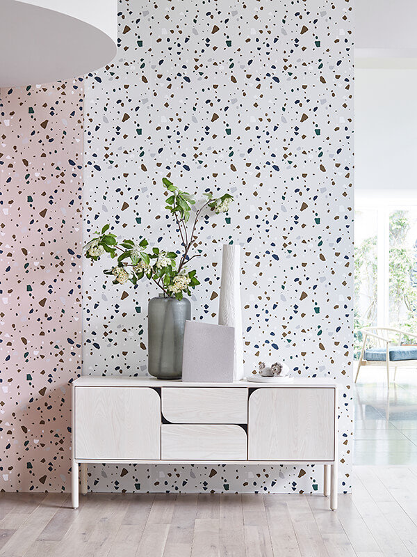 Verso large sideboard in NM finish, with decorative ornaments on the top