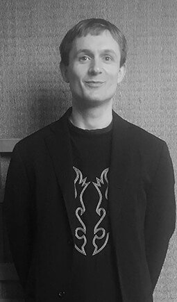 Black and white portrait of Zak Stratfold