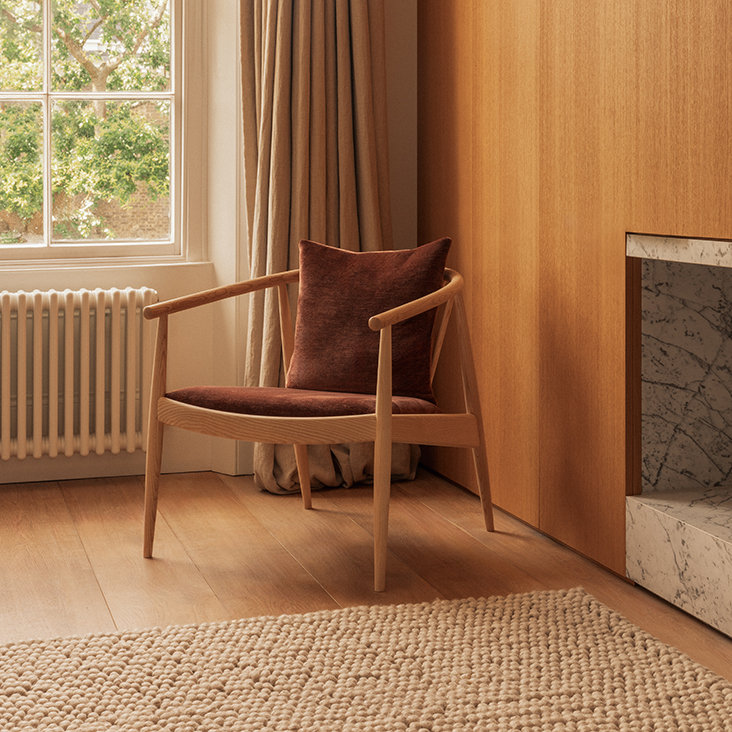 Reprise chair in U018 fabric and CM finish