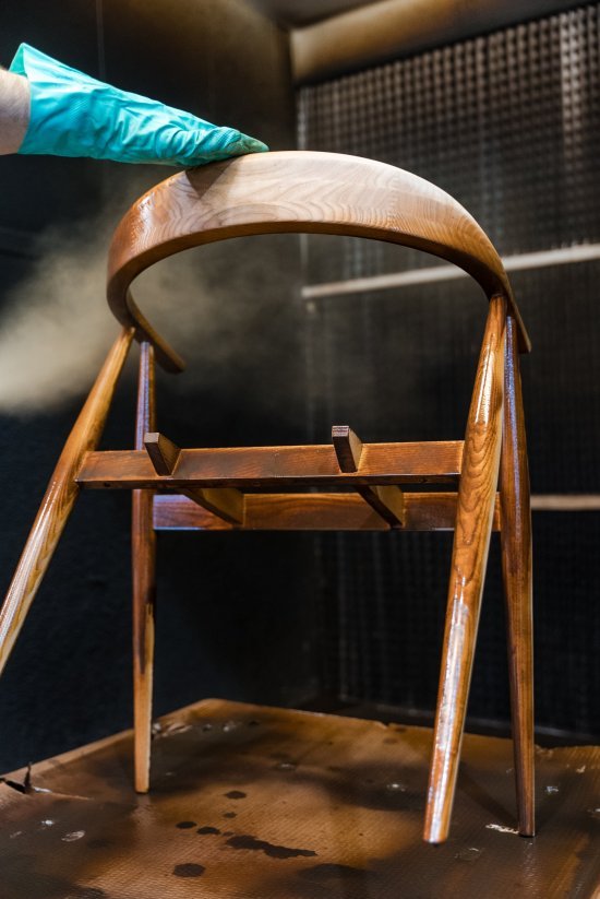 Polishing the Lugo Dining Armchair in our Vintage (OG) stain 