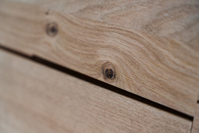 Knots and dots are formed when branches or buds have grown out of the tree trunk