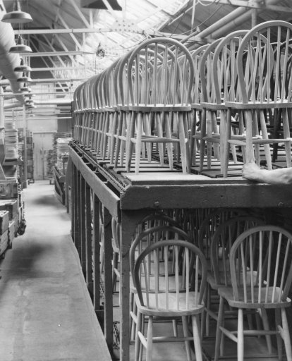 Black and whitre photo of inside an early ercol factory
